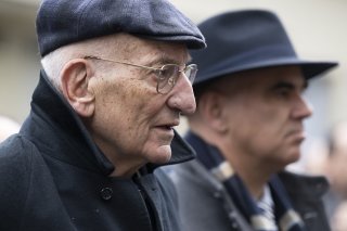 L'ancien conseiller fédéral Pascal Couchepin (gauche) ne partage pas la même analyse que la présidente de la Confédération sur les propos que le vice-président américain JD Vance a tenus à Munich vendredi. Keystone/ANTHONY ANEX